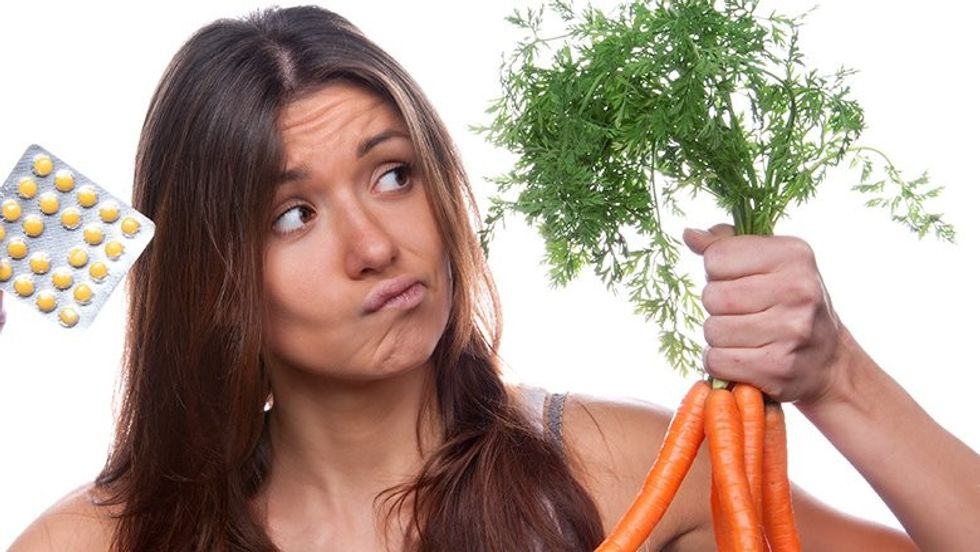 blog image girl with vitamins dollar paid