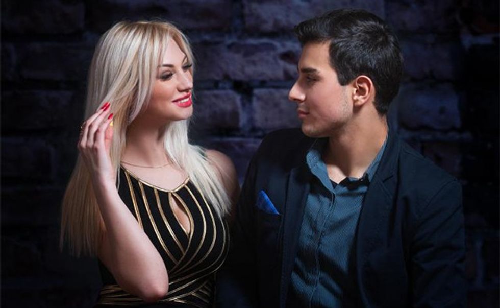 blonde-haired-woman-flirting-with-man