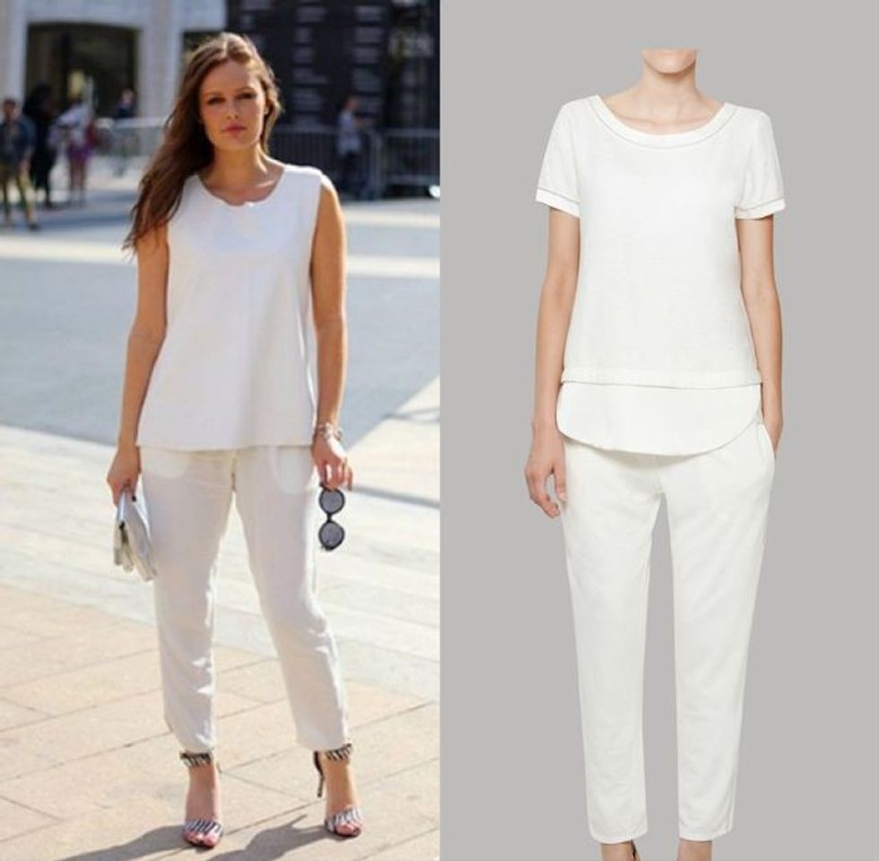 Bluzë e bardhë me mëngë të shkurtra dhe pantallona të bardha.