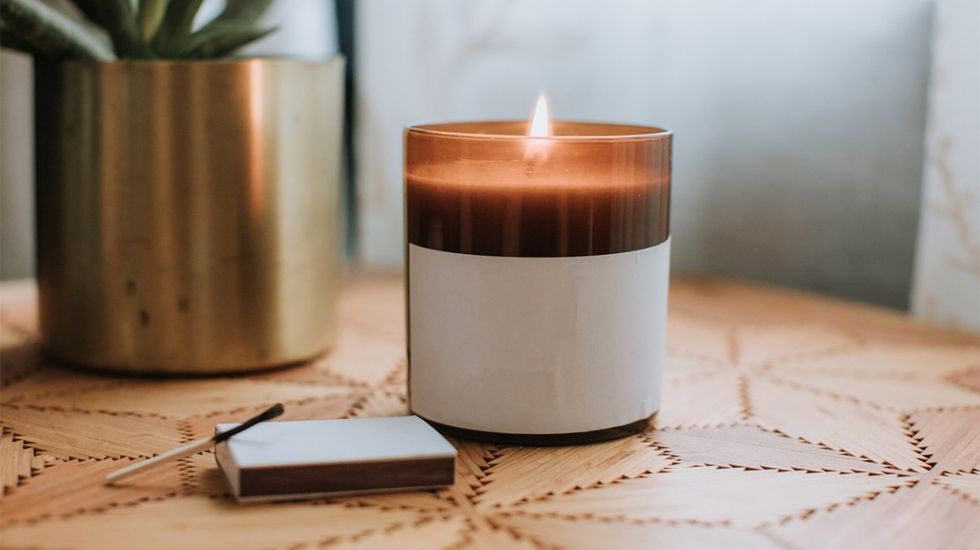 burning candle matchbook header