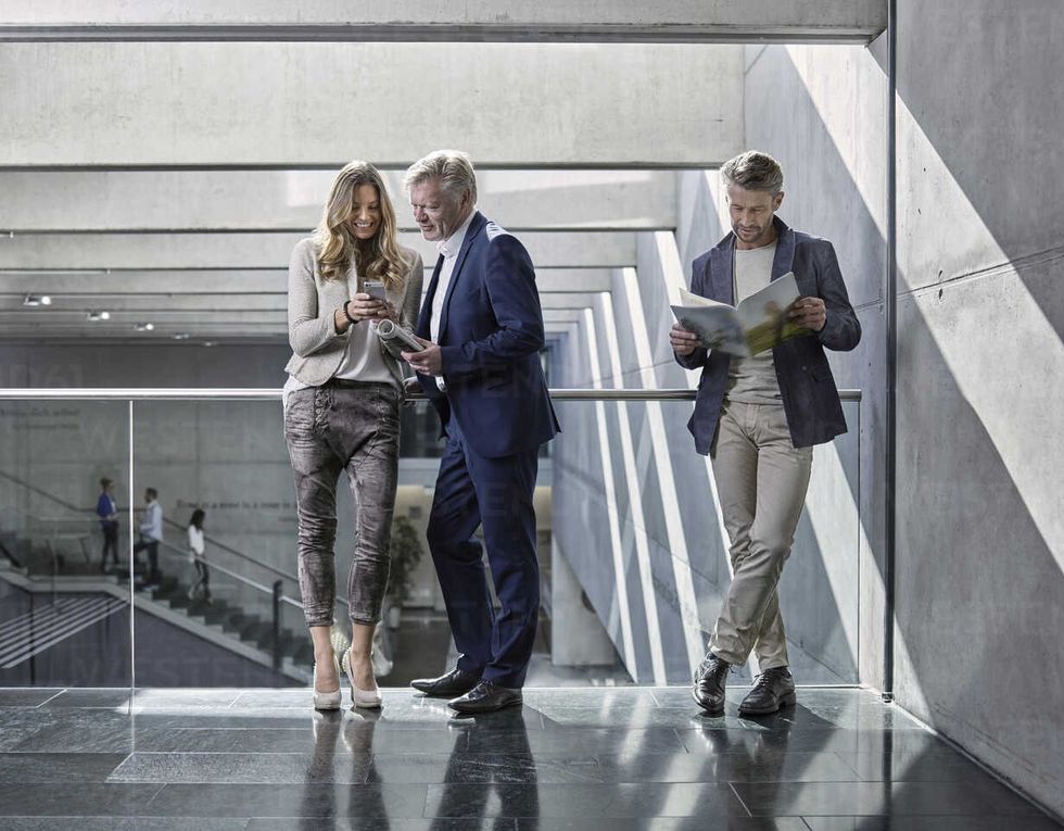 business people talking on office floor CVF00560