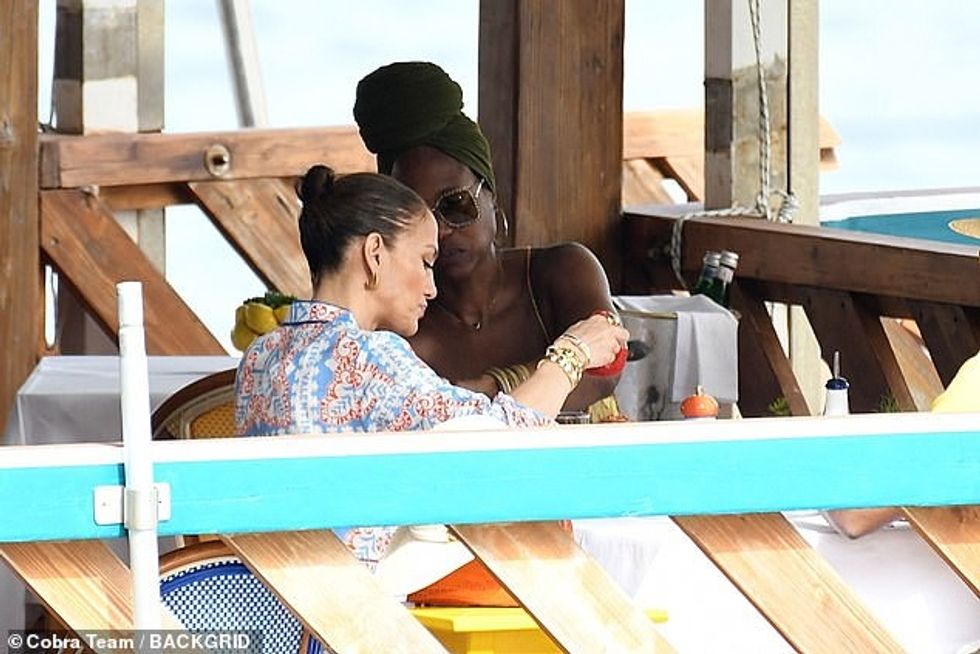 But this week, JLo looked world's away from her loved-up self three years ago as she embarked on a trip to the same location - this time without her husband - even appearing to dine in the exact restaurant she and Ben flirted the night away at