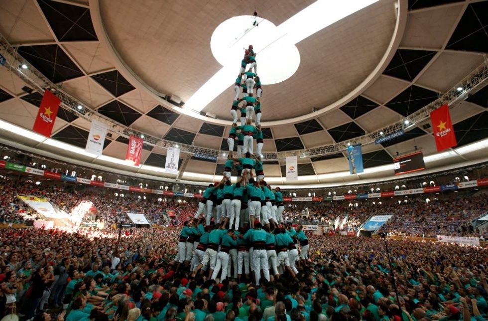 Castellers de Vilafranca form a human tower called
