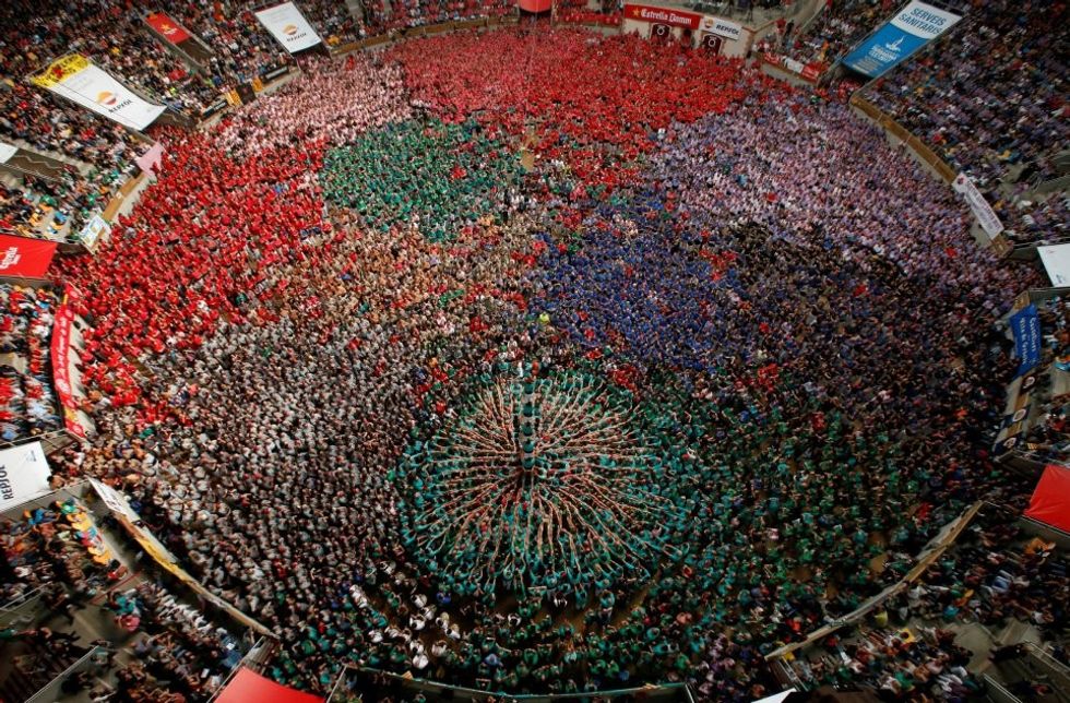 Castellers de Vilafranca form a human tower called