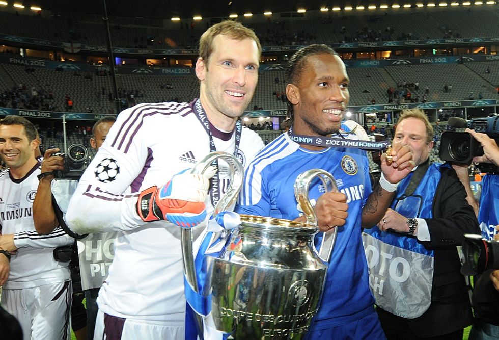 Cech and fellow Blues' hero Didier Drogba celebrate with the trophy after Champions League final glory
