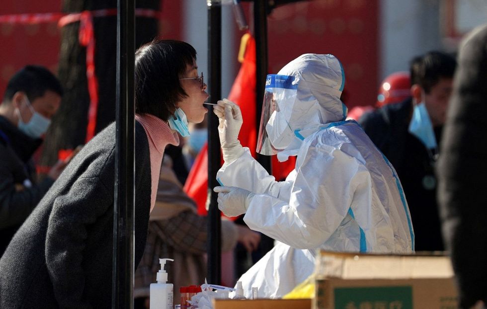 china locks down 13 million over covid 19 e1640187229222