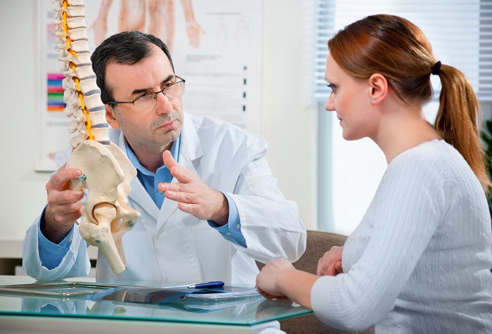 Chiropractor and Patient