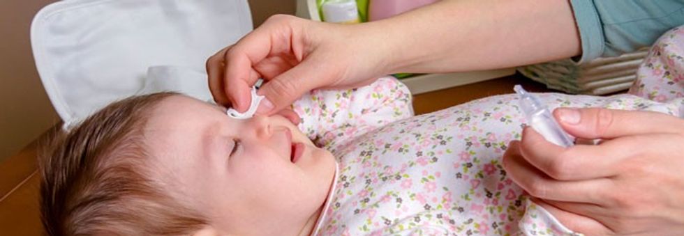 cleaning baby eyes