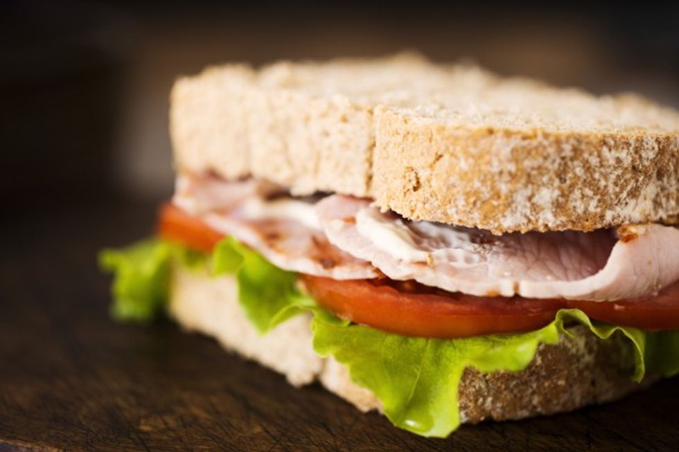 Close up of a bacon lettuce and tomato sandwich.