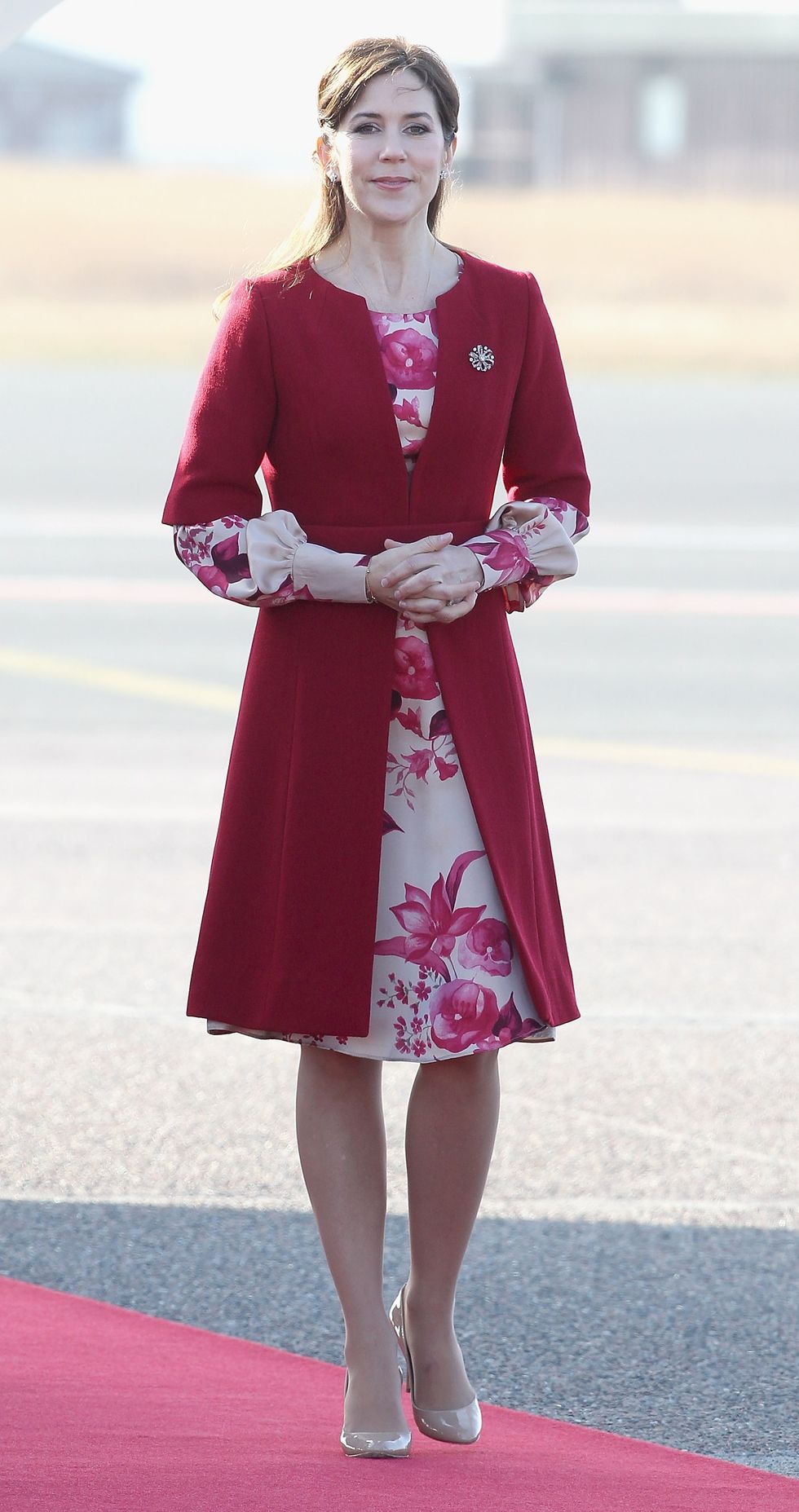COPENHAGEN, DENMARK - MARCH 24: Princess Mary of Denmark waits to greet Prince Charles, Prince of Wales at Copenhagen Kastrup Airport on March 24, 2012 in Copenhagen, Denmark. Prince Charles, Prince of Wales and Camilla, Duchess of Cornwall are on a Diamond Jubilee tour of Scandinavia that takes in Norway, Sweden and Denmark. (Photo by Chris Jackson/Getty Images)