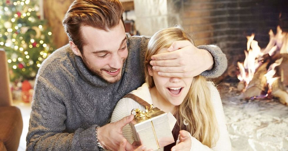 Couple exchanging gifts on Christmas