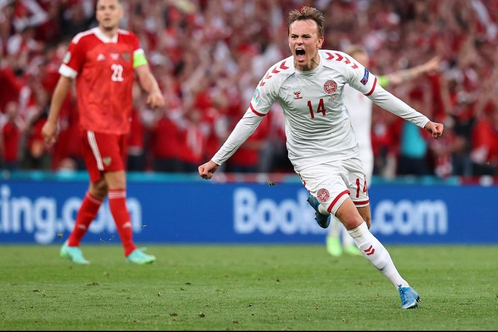 denmark midfielder mikkel damsgaard celebrates scoring against russia at euro 2020 group b clash e1624351386621