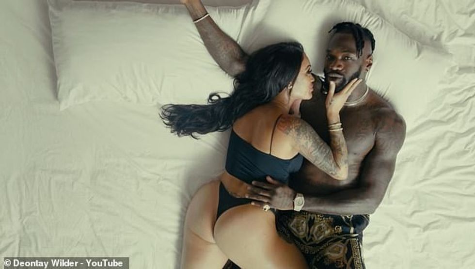 Deontay Wilder has swapped the boxing ring for the music studio as he's released first music video. He features topless alongside fiancee Telli Swift wearing a black thong at one point