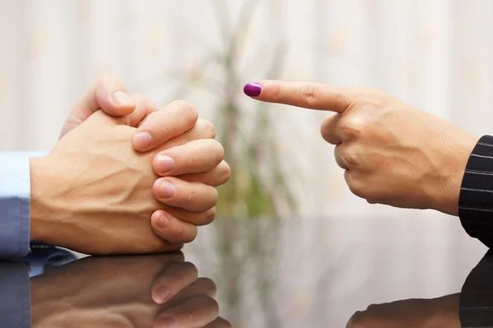 depositphotos 55948021 stock photo a woman accuses a man