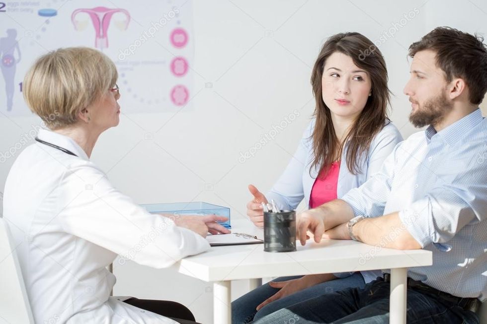 depositphotos 73401061 stock photo couple at the doctor