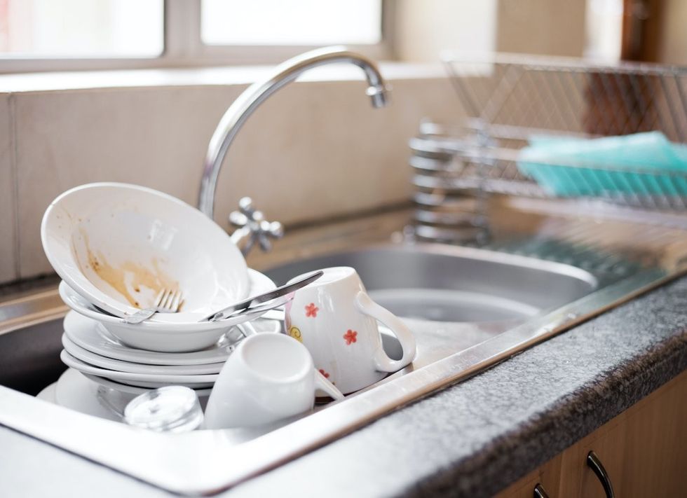 dishes piling up in sink