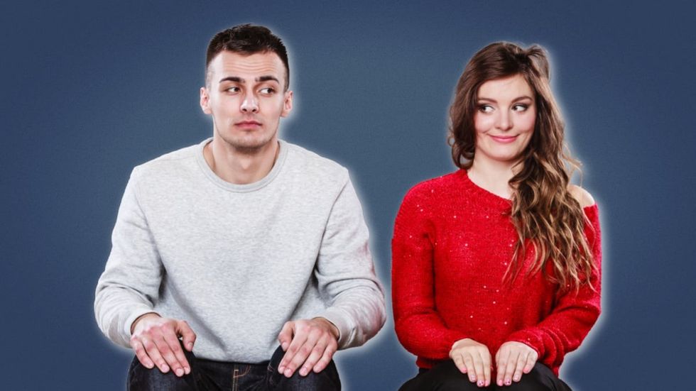 Do girls like shy guys Shy man and shy woman sitting next to each other awkwardly