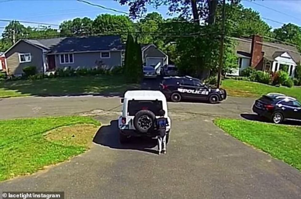 Eliah stood absolutely still until the patrol car had driven out of sight