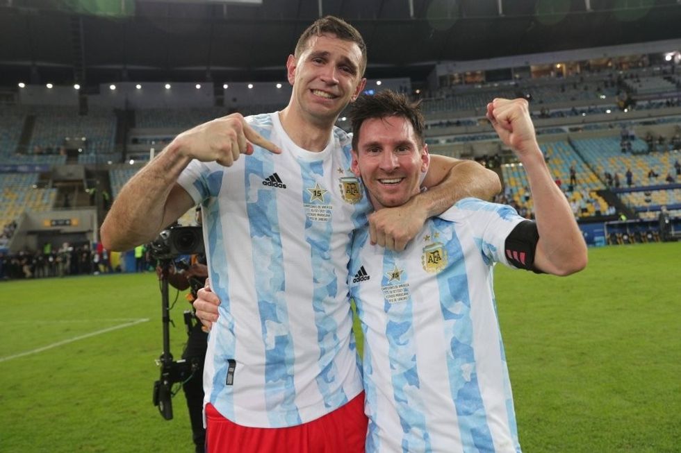 Emiliano Martinez and Lionel Messi