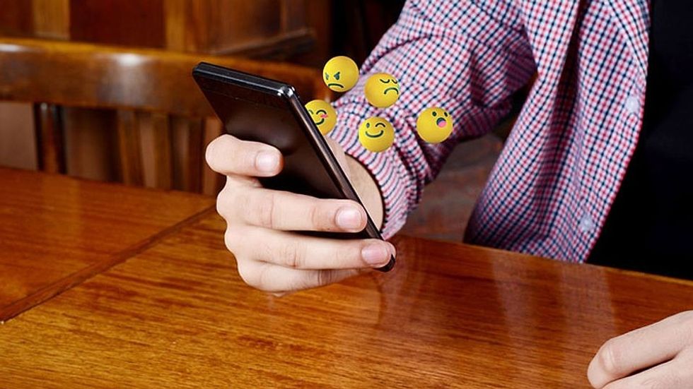 emoji phone istock