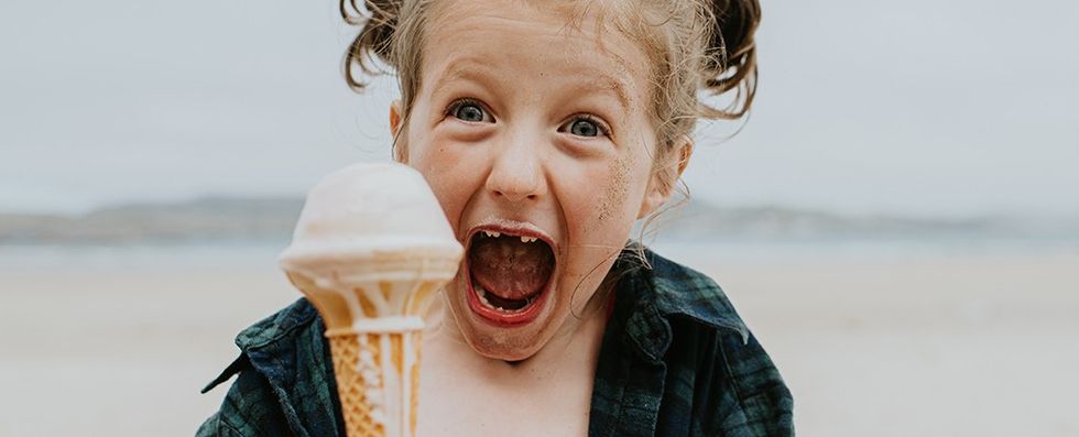 excited girl eating icecream