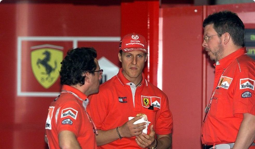 f1 canadian gp 2001 michael schumacher ross brawn and luca baldisserri e1563518477194