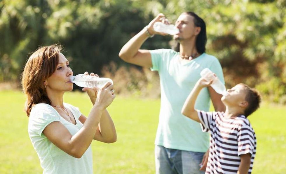 family drinking water