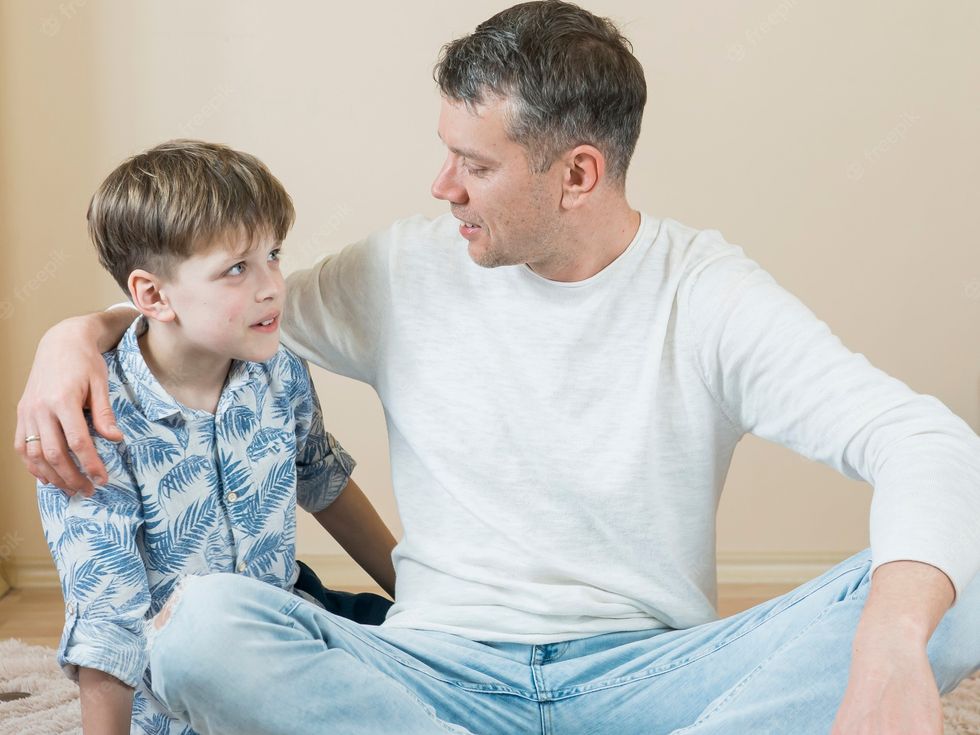 father son talking floor 23 2148511422