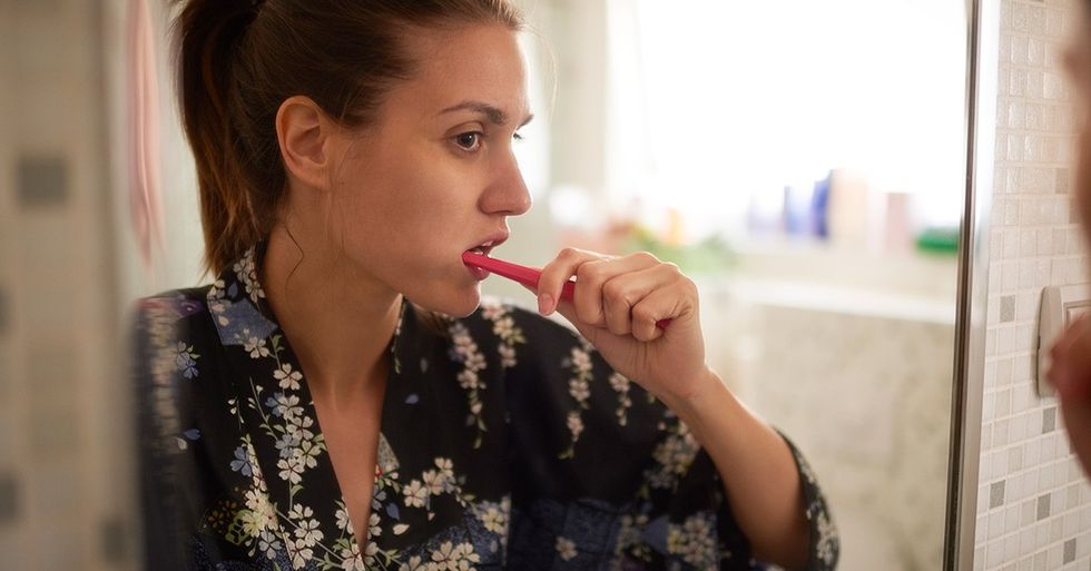 FEmale Brush Teeth Mirror Facebook