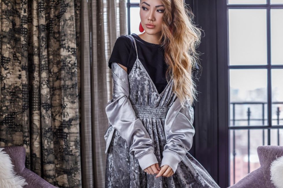 female hands holding bowl vegan lunch avocad