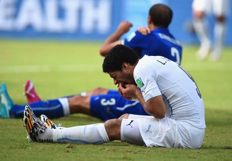 FILE Uruguay Striker Luis Suarez Has Been Suspended For four Months