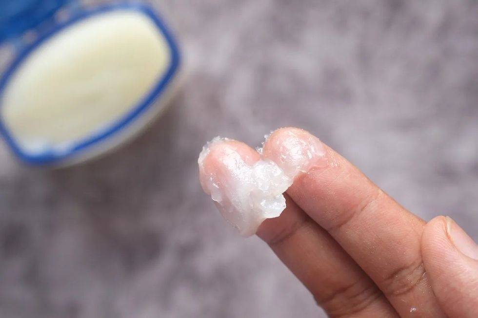 fingers with petroleum jelly