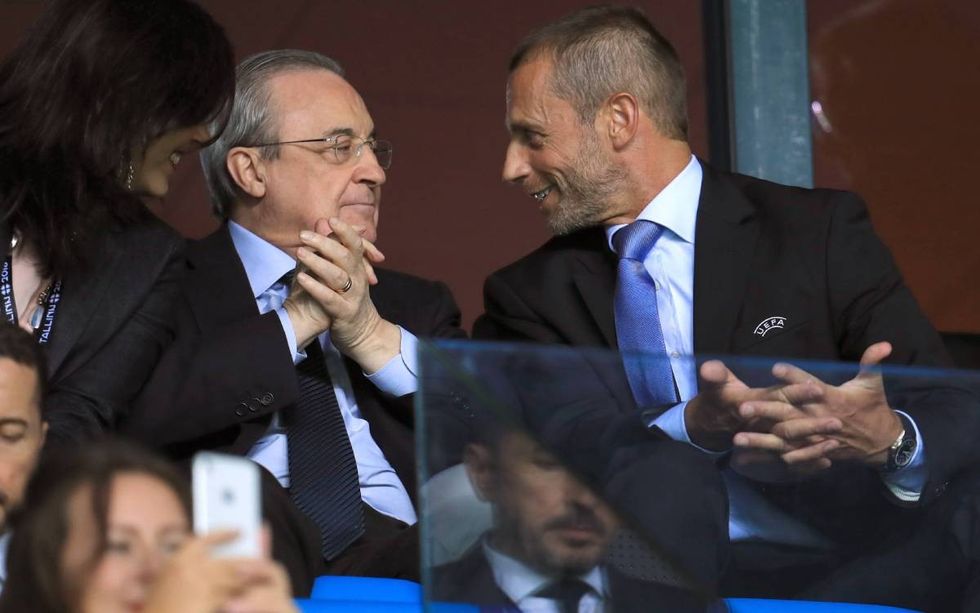 florentino perez presidente del real madrid junto a aleksander ceferin presidente de la uefa