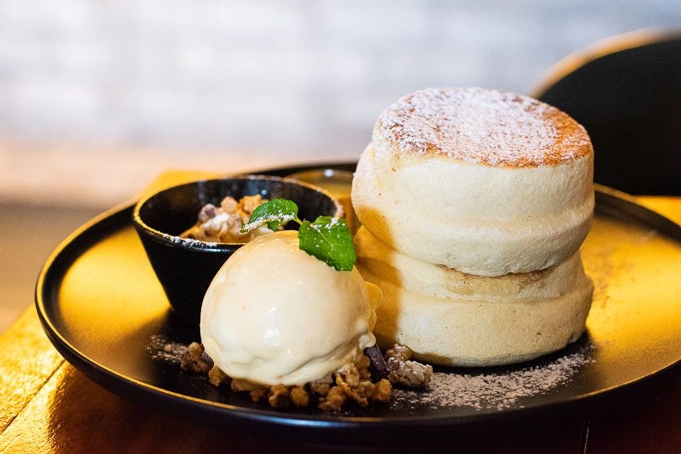 fluffy japanese souffle pancakes served with vanilla ice cream free photo