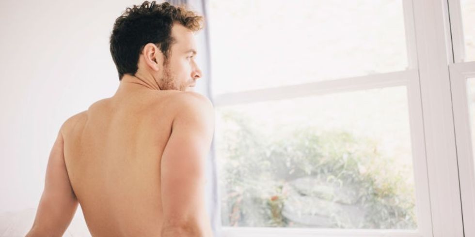 gallery 1496309359 man looking out window