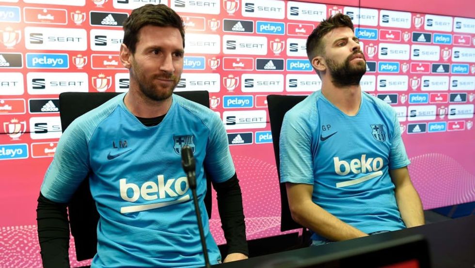 gerard pique and lionel messi 5da2f3fe4144df4ca4000001