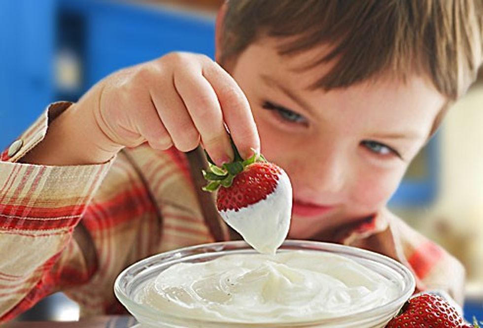getty_rm_photo_of_child_eating_yogurt_for_omega_3
