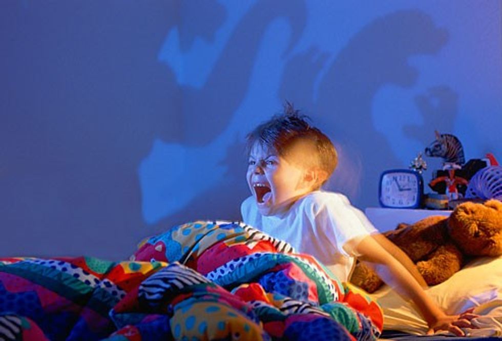 getty rm photo of little boy waking from nightmare revised
