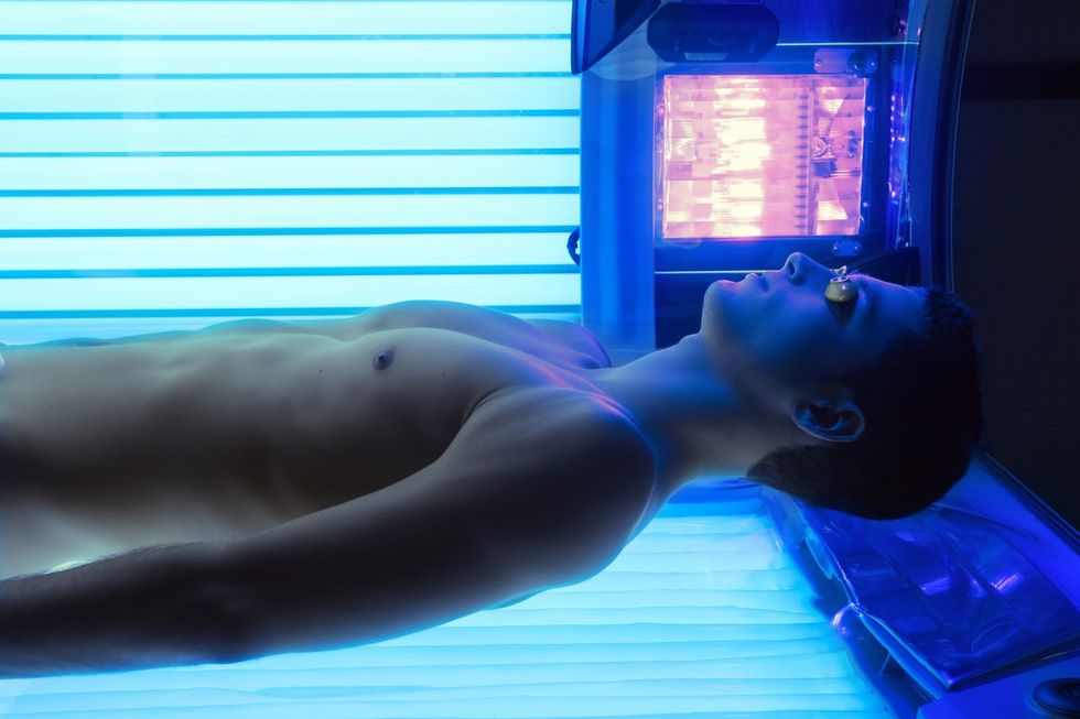 GettyImages 120280002 man tanning cropped 1 scaled
