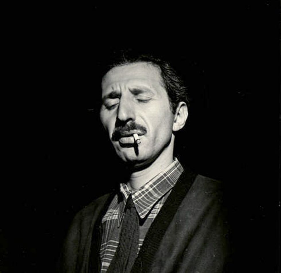 Gjon Mili Albanian born American photographer Gjon Mili 1904 1984 smokes a cigarette on set of his film Jammin the Blues Hollywood California October 10 1944. Photo by Gjon Mili1