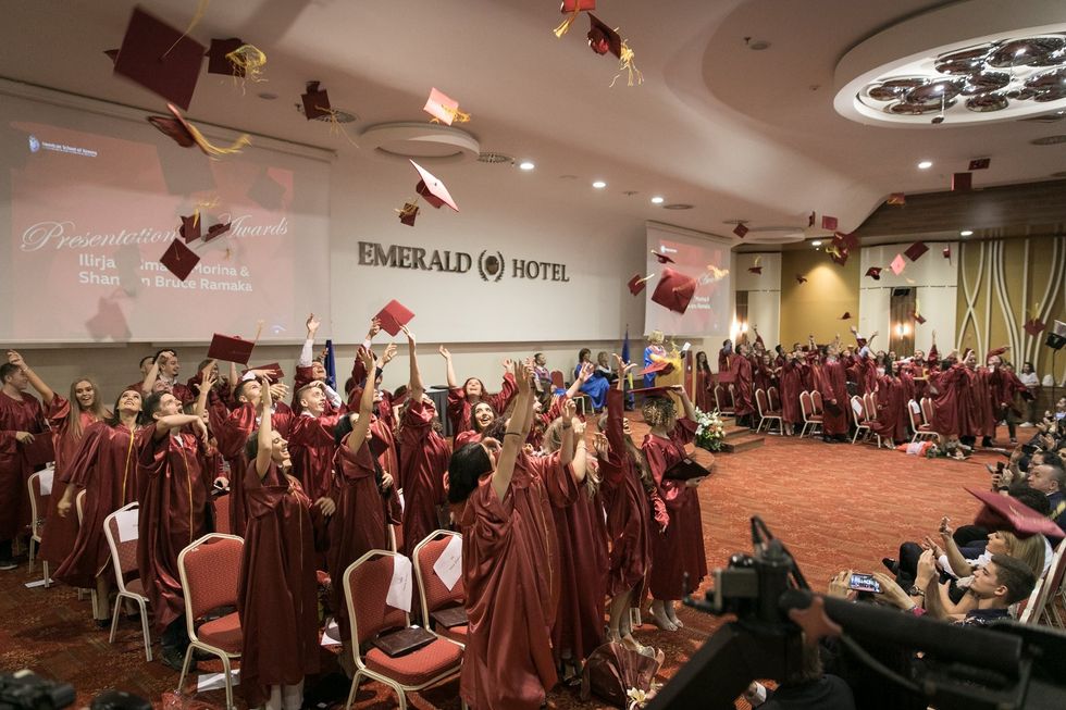 graduation throwing hats