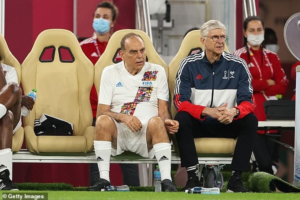 Grant (pictured centre in December 2021) has been coaching in Thailand, Africa and India in recent years