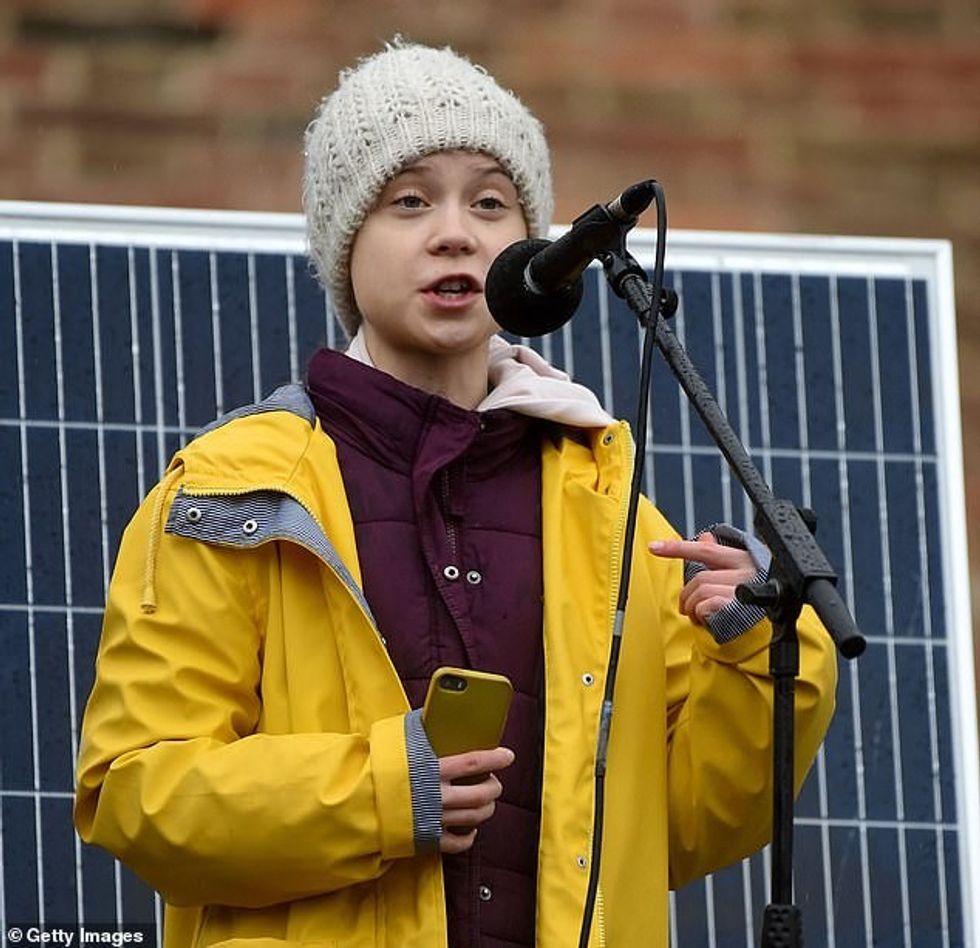 Greta Thunberg, pictured in Bristol in February ahead of the Covid-19 lockdown has said she believes the coronavirus crisis has brought the world to a social tipping point