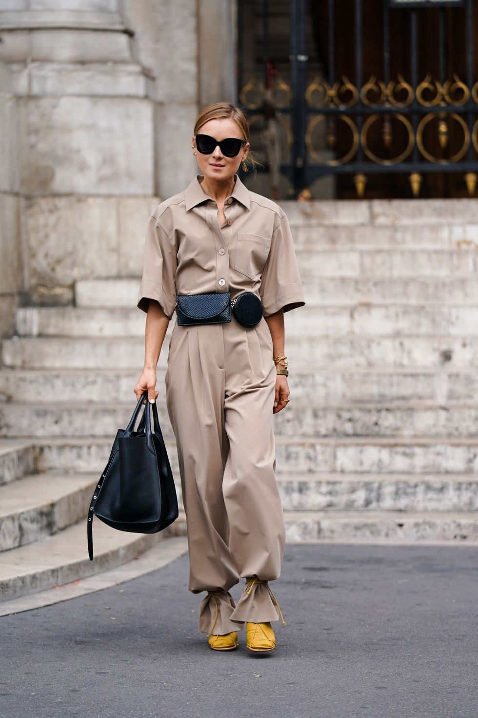 guest wears earrings sunglasses bracelets a beige short news photo 1580152714