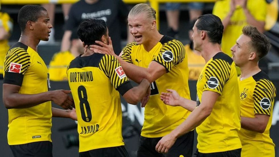 haaland stars as dortmund rout frankfurt