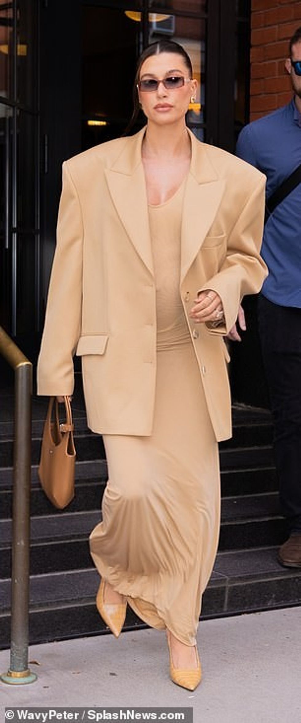Hailey Bieber commanded attention in New York City on Sunday as she headed to a promotional event for her skincare company Rhode