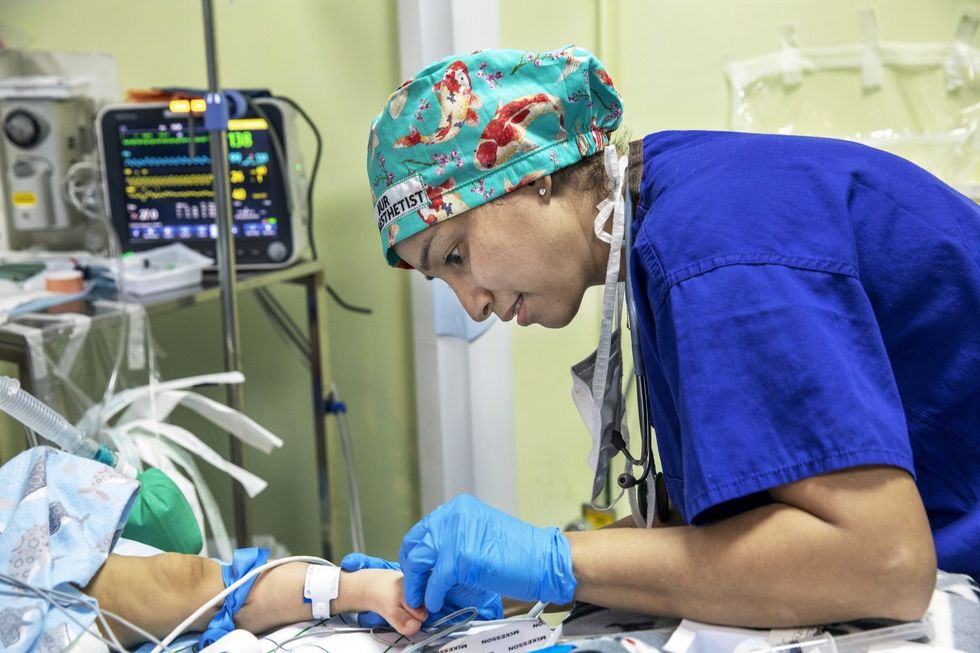 hand patient with an intravenous drip photo