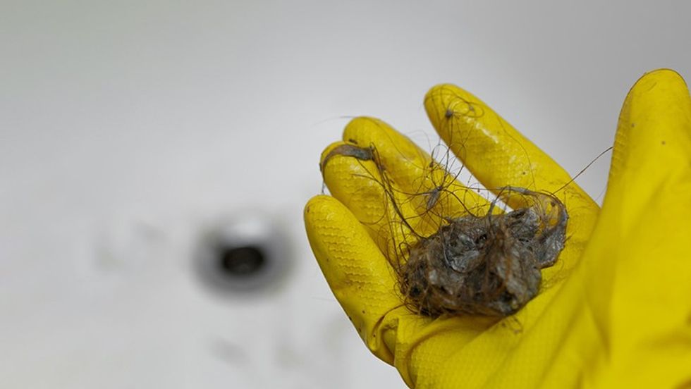 hand with rubber glove