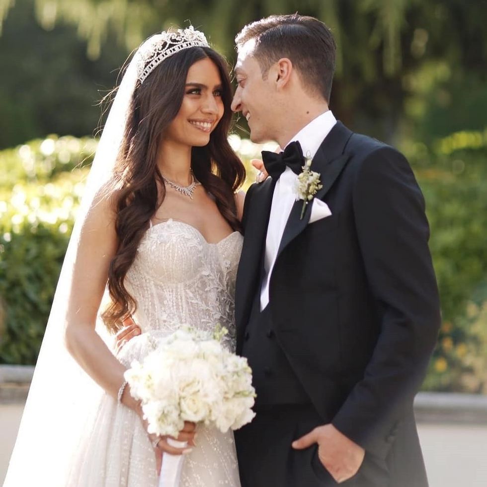 Happily married: The Arsenal man used his wedding day as a chance to reach out to those in need