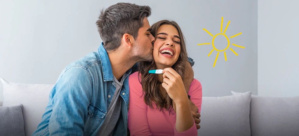 happy couple positive pregnancy test free spa